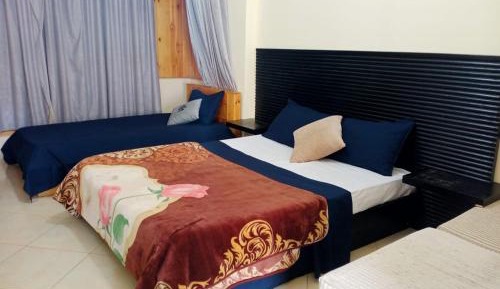 Quadruple Room with Private Bathroom