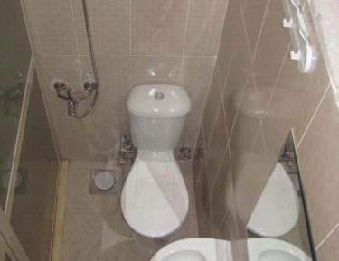 Single Room with Bathroom and Fan