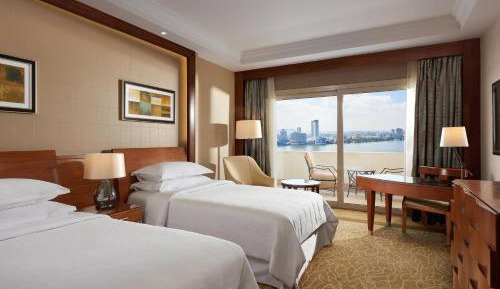 Premium Twin Room with Balcony and Partial River View