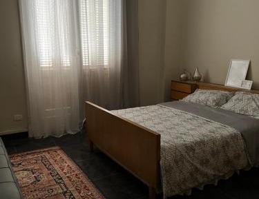 Queen Room with Shared Bathroom