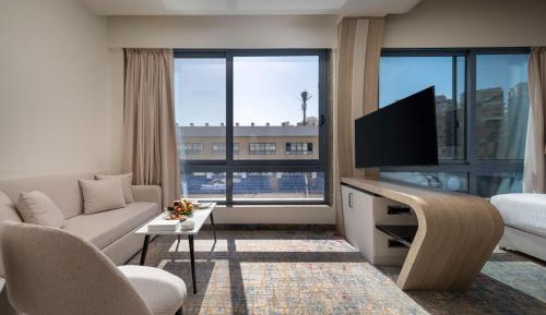 Premium Room with Two Single Beds, Sofa Bed and Pool View
