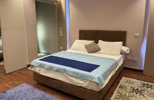 Heliopolis Apartment | The Cairo International Airport, 5 km from A Family Friendly Apartment.