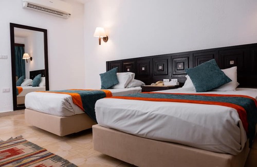 Ras Umm Sid Hotel | Turquoise Beach Hotel