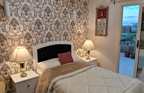 Qasr an-Nil Apartment | 15 Bustan Downtown Timeless class, modern comfort