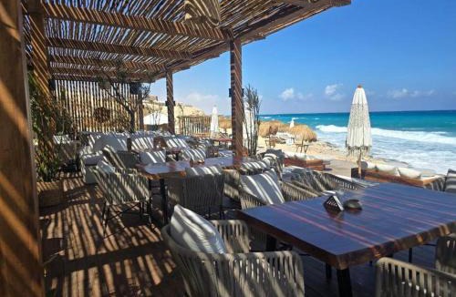 Ad-Dab'ah Ski Chalet | Jefaira Ras Al Hikma- 4 BR Senior Chalet with private garden, Sea view
