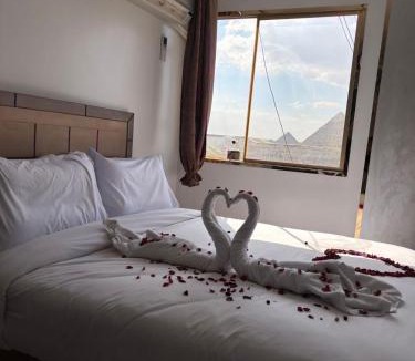 Qasr an-Nil Hotel | Golden Pyramids Hotel & Roof Top