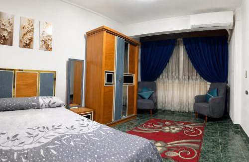 Al Duqqi Apartment | مفروش بالكامل
