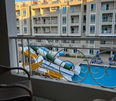 Al Mamsha El Seyahi Apartment | Pool View Apartment Near Airport & Beach
