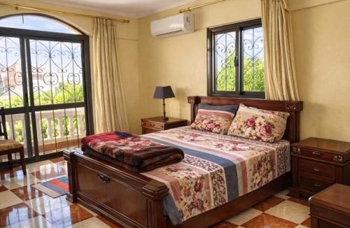 Al-'Amriyah Villa | Yellow Family Villa - Private Pool - AC- 5 Min Walk to Beach -