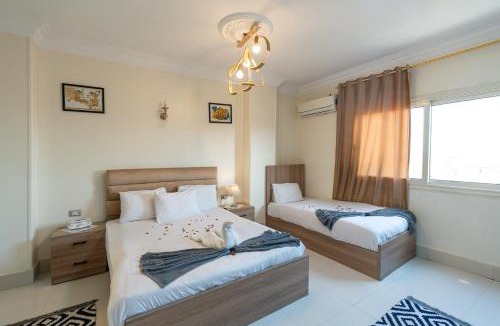 Kafrat al Jabal Apartment | 9 Pyramids & Sphinx View Apartment