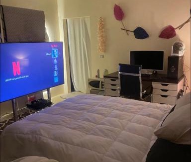 New Cairo Hotel | Luxurious Sound System Room Near AUC