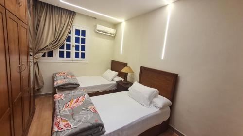 Al Duqqi Apartment | RD Served Apartment 3-Bedroom Dokki - Ideal Location Downtown Cairo