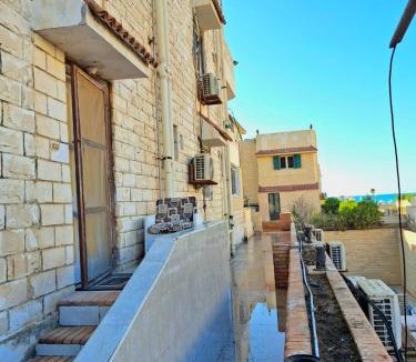 Marina El Alamein Apartment | 2B equipped basement chalet with 2 beds pool view green beach villa 114b
