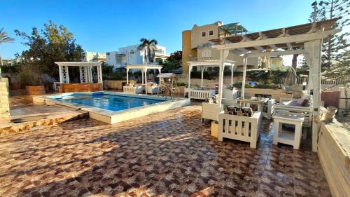 Marina El Alamein Apartment | 1CH1 studio 2beds ground floor sea view 114 green beach