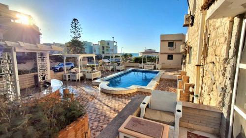 Marina El Alamein Apartment | 1CH1 studio 2beds ground floor sea view 114 green beach