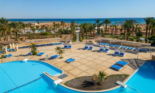 Village Road Resort | SUNRISE Juman Beach Resort