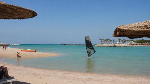 Village Road Apartment | Resort Apartment by Lagoon Beach with Pools & Aqua Park