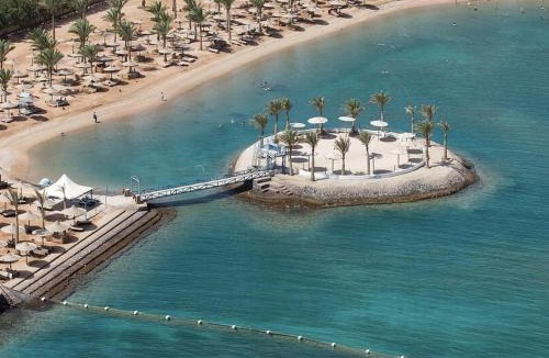 Village Road Apartment | Resort Apartment by Lagoon Beach with Pools & Aqua Park