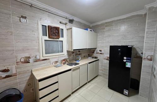 Sheikh Zayed City Apartment | A serviced three - bedroom apartment exclusively for you, located in one of the best areas in Sheikh Zayed