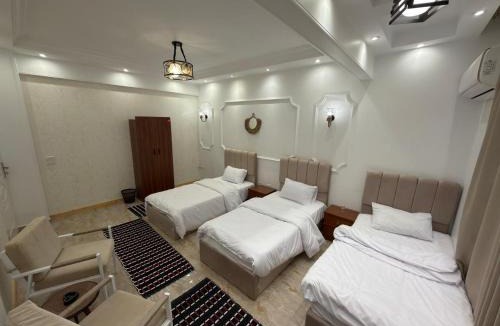 Al Haram House | TriPyramids Suites