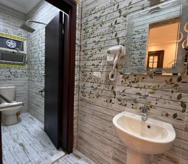 Al Haram House | TriPyramids Suites