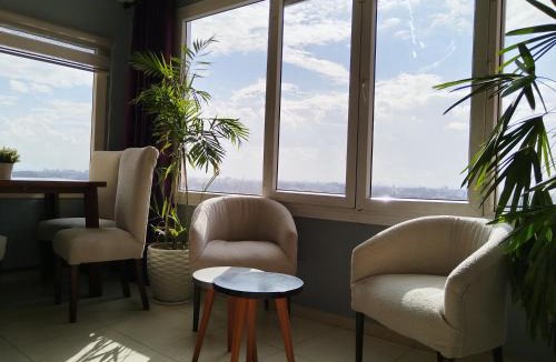 Maadi Apartment | The Traveler's Nile Retreat-Work, Heal & Wake to Pyramids