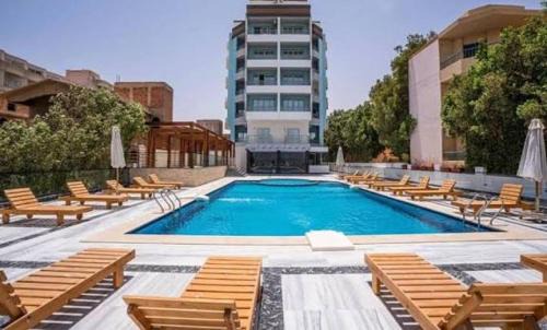 Al Ahyaa Apartment | Modern Studio with Pool and Private Beach Access