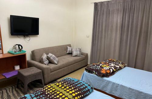 Zafarana Hotel | La sirena double room with mountain view, Families and couples only, Extra of 200 Egyptian pounds per adult person per stay ,to be paid to the resort