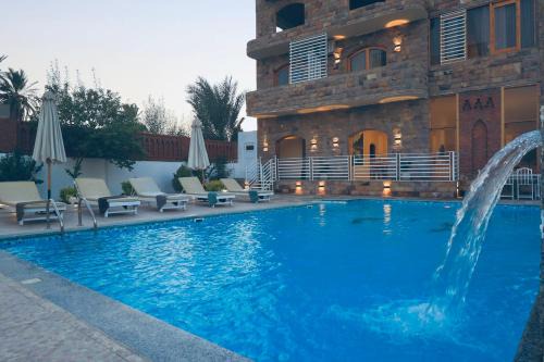 citadel hotel in Al Aqālitah