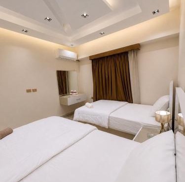 Serene Twin Room Steps to Gameat Al-Dowal