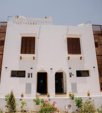 شاليه قرية تونس بمسبح خاص in Qaryat at Ta‘mīr as Siyāḩīyah